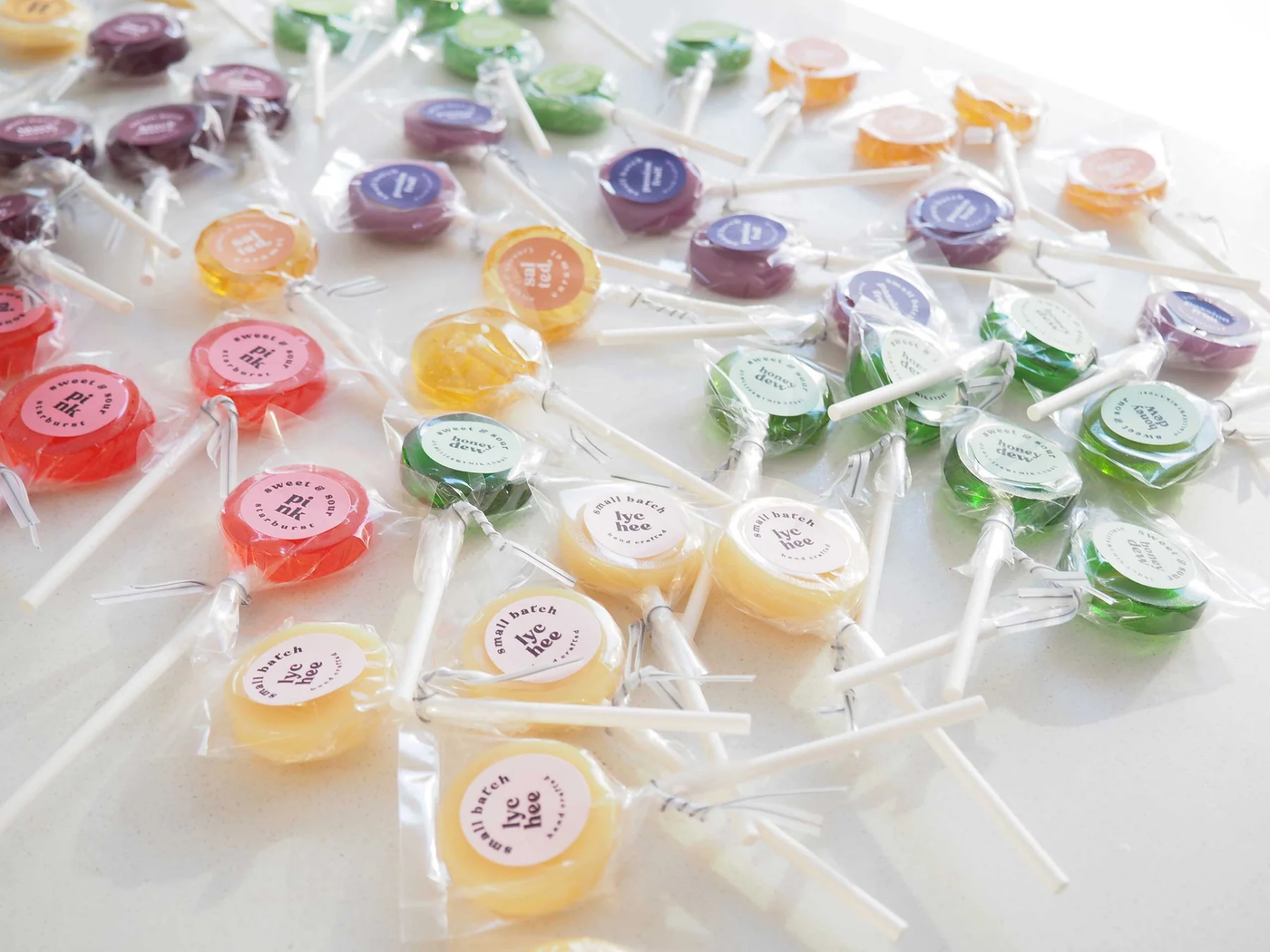 gourmet candy lollipops on counter