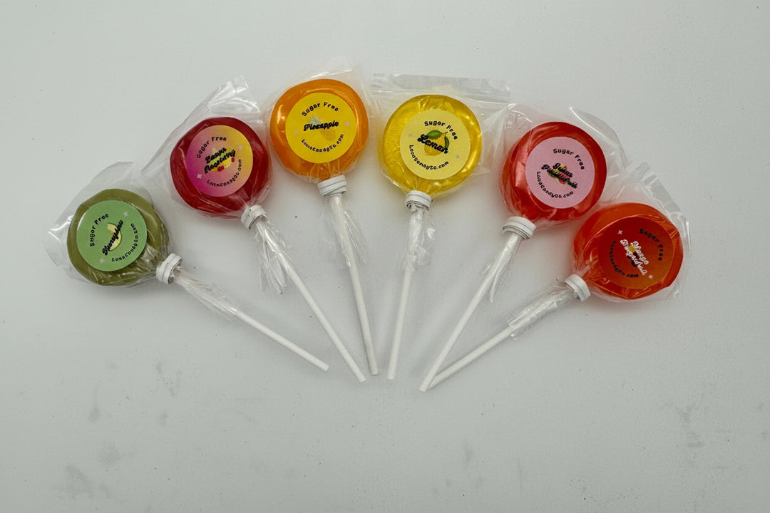 Set of colorful sugar free lollipops with  Luna Candy Co logo on a white background