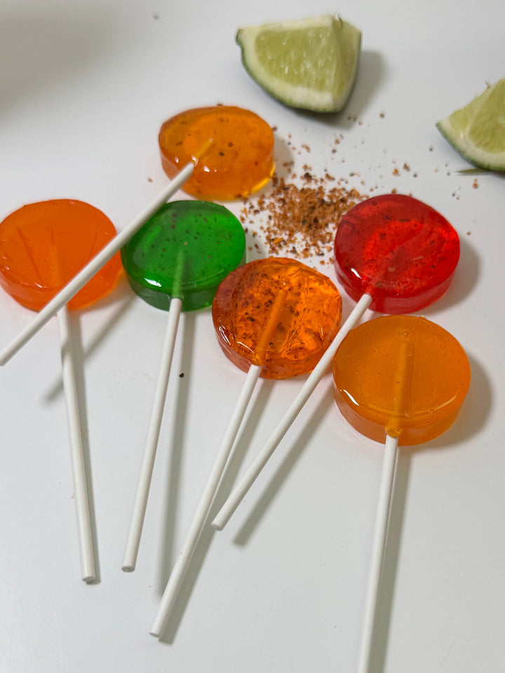 close up fiesta lollipop collection with tajin and lime