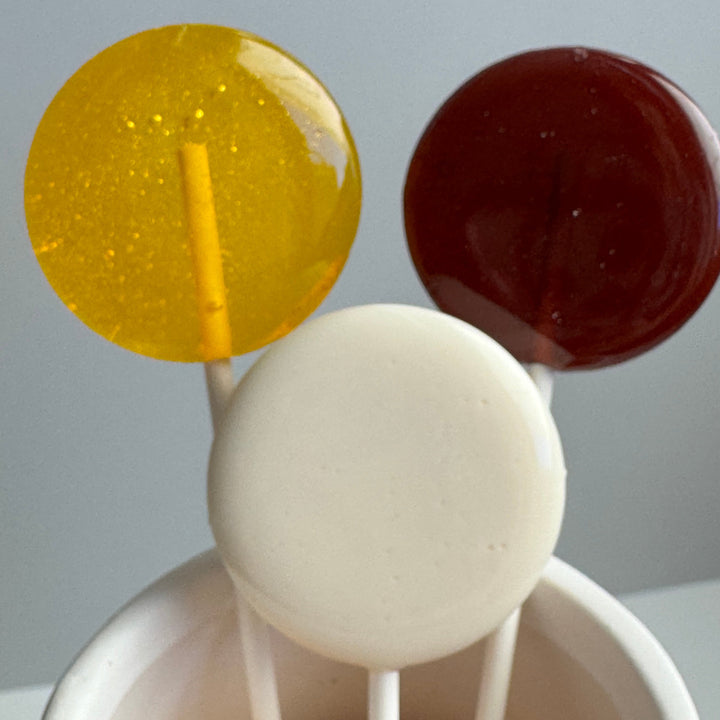 Honey Bee lollipop favors with bee-themed label design