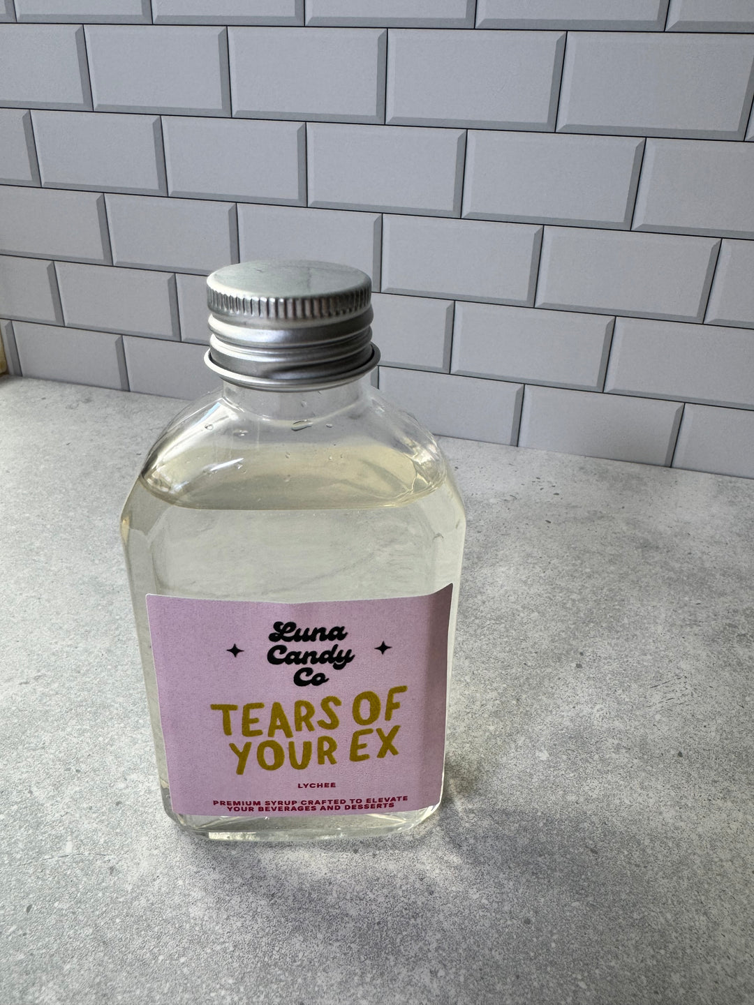 Luna Candy Co Tears of Your Ex Lychee Drink Syrup with subway tile