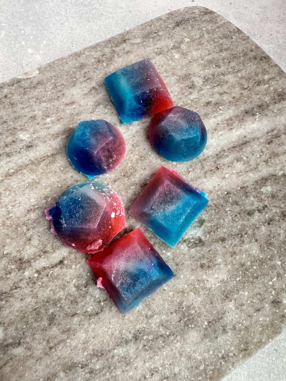 Blue, purple, and pink cotton candy and strawberry kohakutou crystal candies